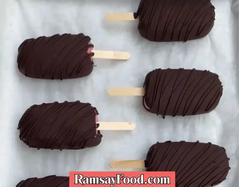 Homemade berry ice cream bars with fresh berries and cream