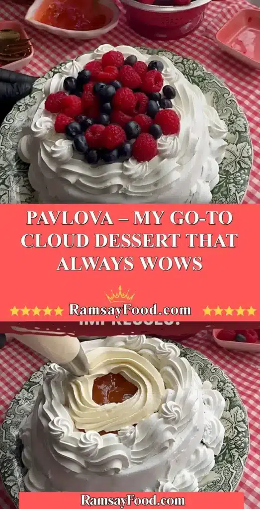 Delicious homemade Pavlova dessert topped with fresh fruit and cream.