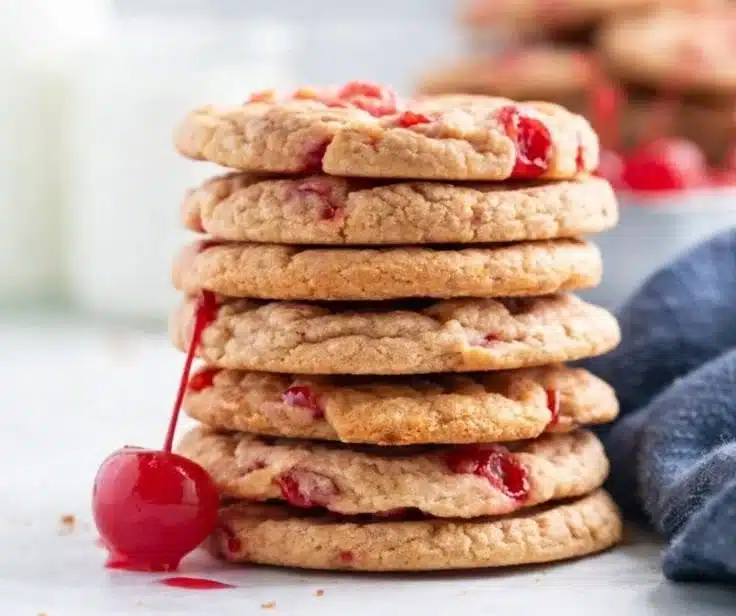 Freshly baked Cherry Almond Cookies on a decorative plate