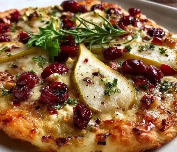 Delicious Pear, Brie, and Cranberry Flatbread ready to enjoy.