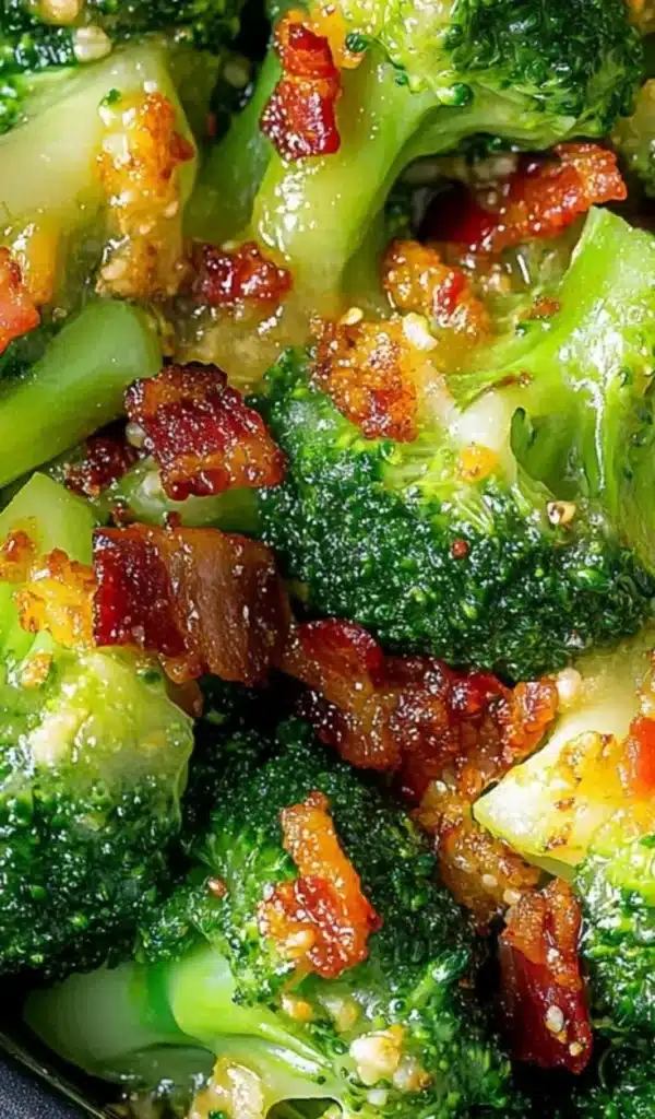 Plate of savory broccoli with garlic sauce and crispy bacon