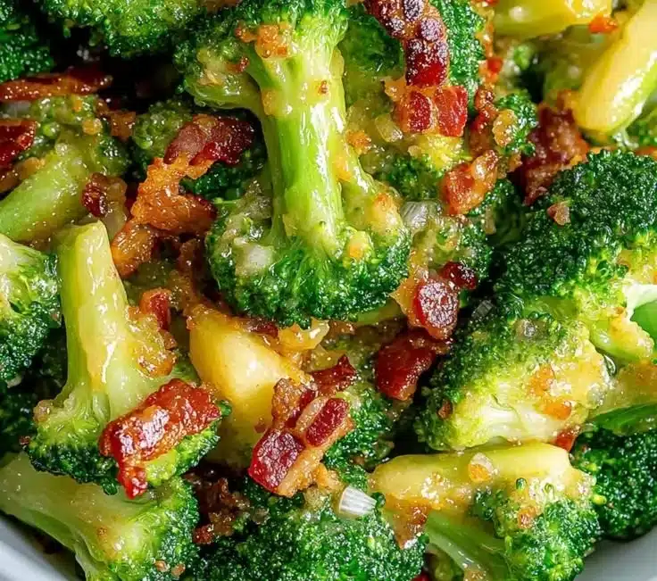 Bowl of savory broccoli with garlic sauce and crispy bacon