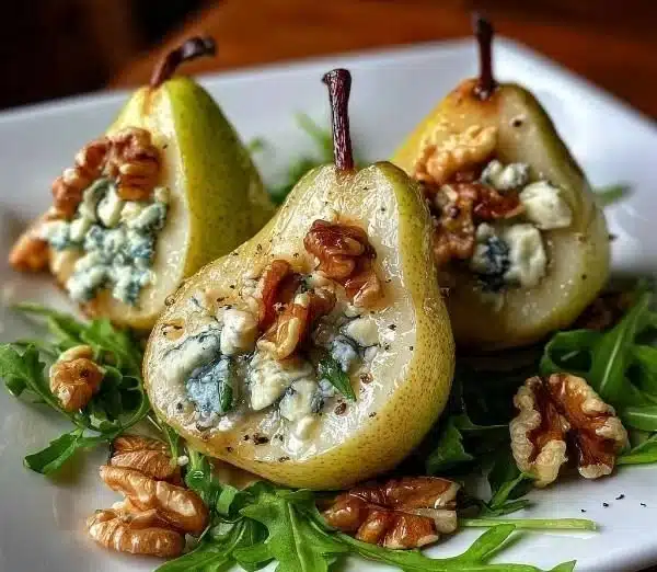 Appetizing blue cheese stuffed pears on a elegant serving plate