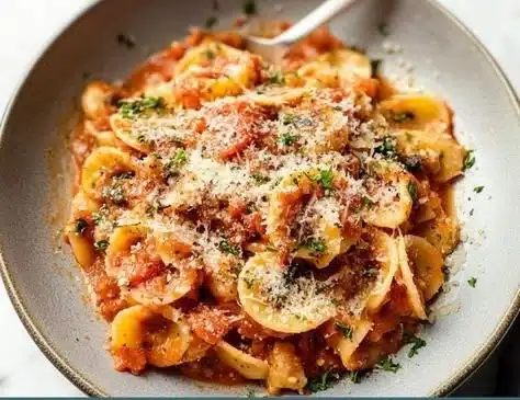 Delicious plate of Chicken Fra Diavolo with spicy sauce and garnishes