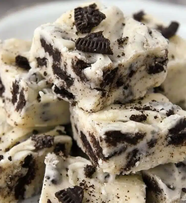 Delicious Oreo Fudge dessert topped with crushed Oreos