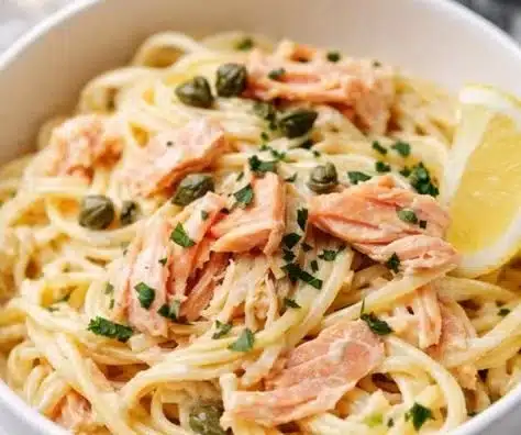 Healthier smoked salmon linguine with fresh ingredients and vibrant colors